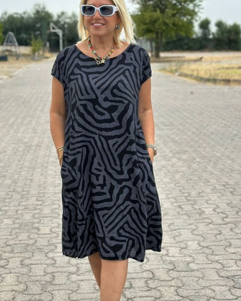 Melia | Letnia sukienka z okrągłym dekoltem i pięknym nadrukiem