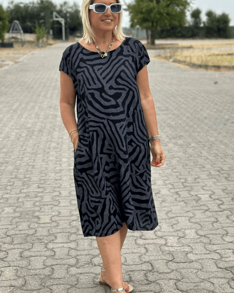 Melia | Letnia sukienka z okrągłym dekoltem i pięknym nadrukiem